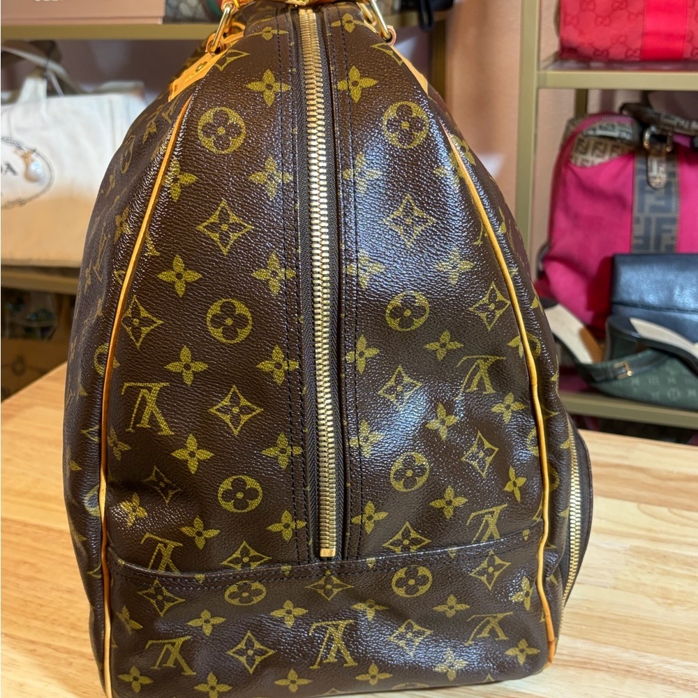 Louis Vuitton Evasion Monogram Travel Bag - Picture 4 of 16